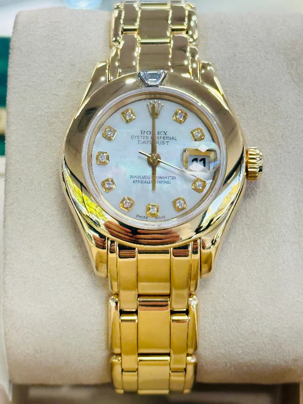 Watches with a classic look   Rolex Lady-Datejust Pearlmaster 18K Yellow Gold 69328 Factory Mother Of Pearl Factory Trapezoid Diamond Bezel MINT